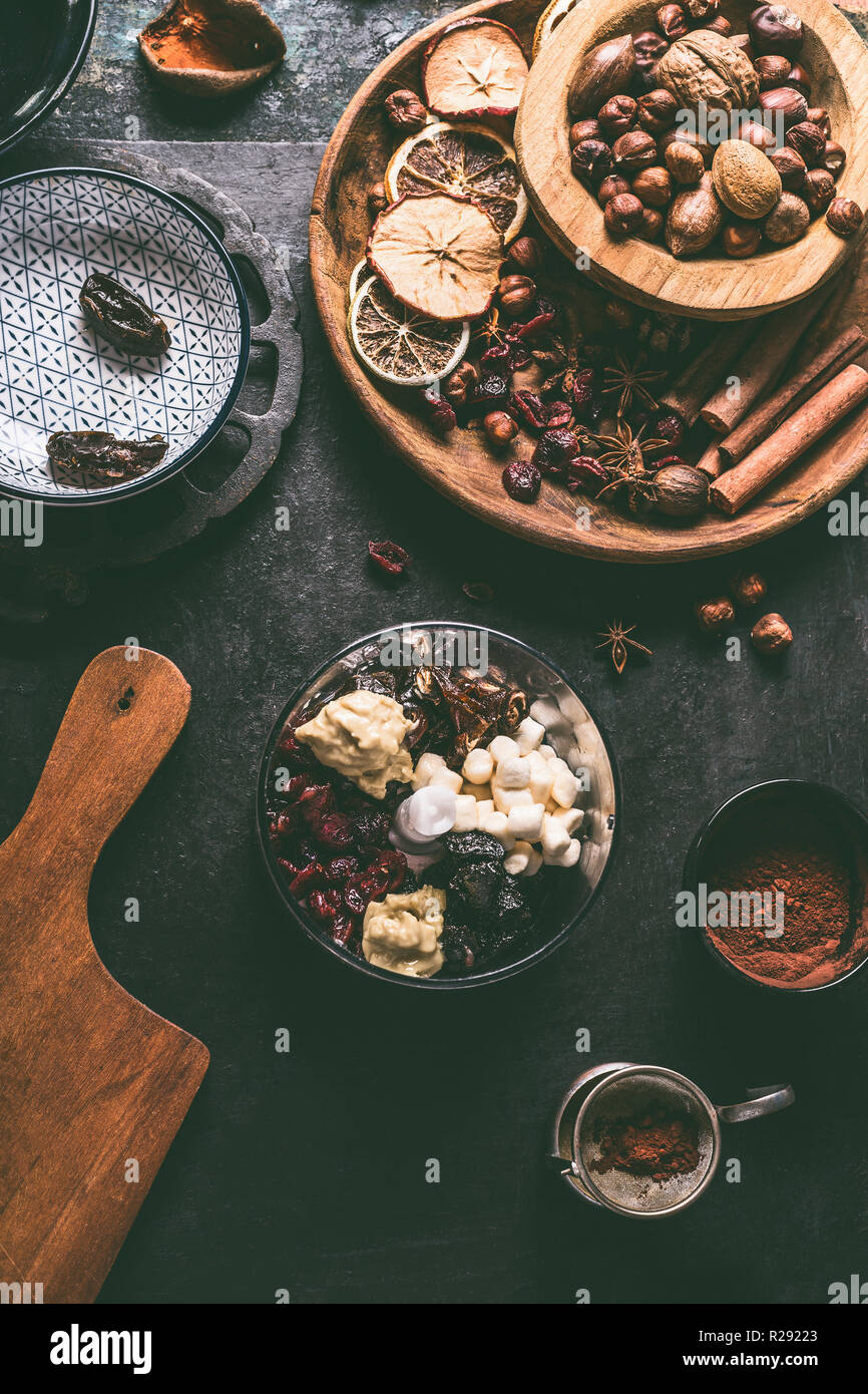 Healthy vegan truffle ingredients in mixer dates, dried cranberries