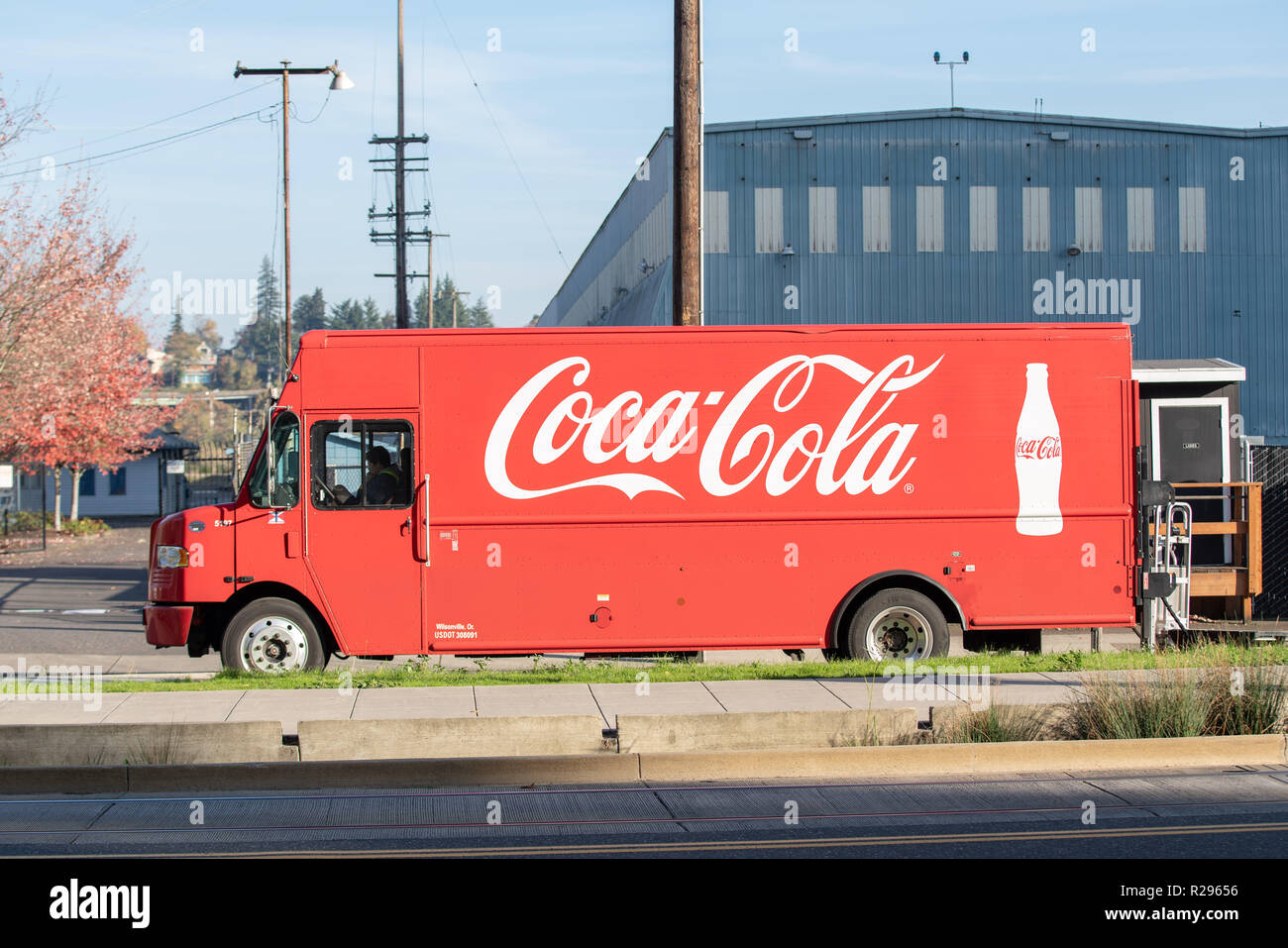 Portland, OR / USA - November 15 2018: Coca cola company delivery van parked by the curb. Stock Photo