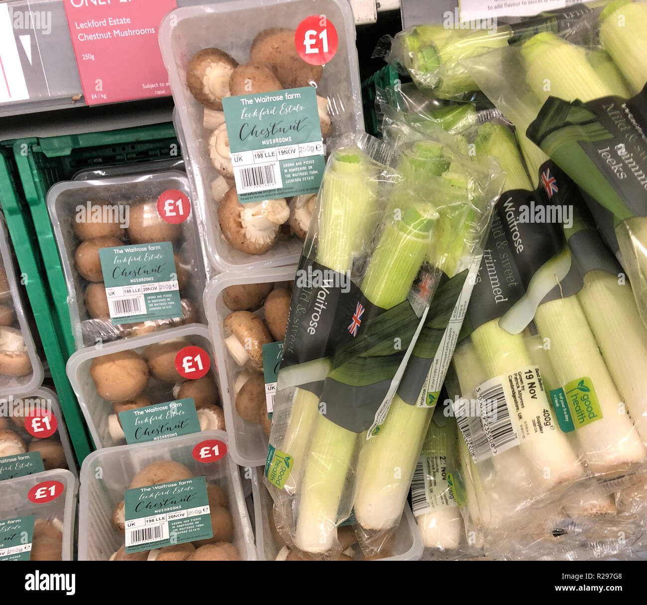 PACKAGED VEGETABLES including mushrooms and celery in a branch of