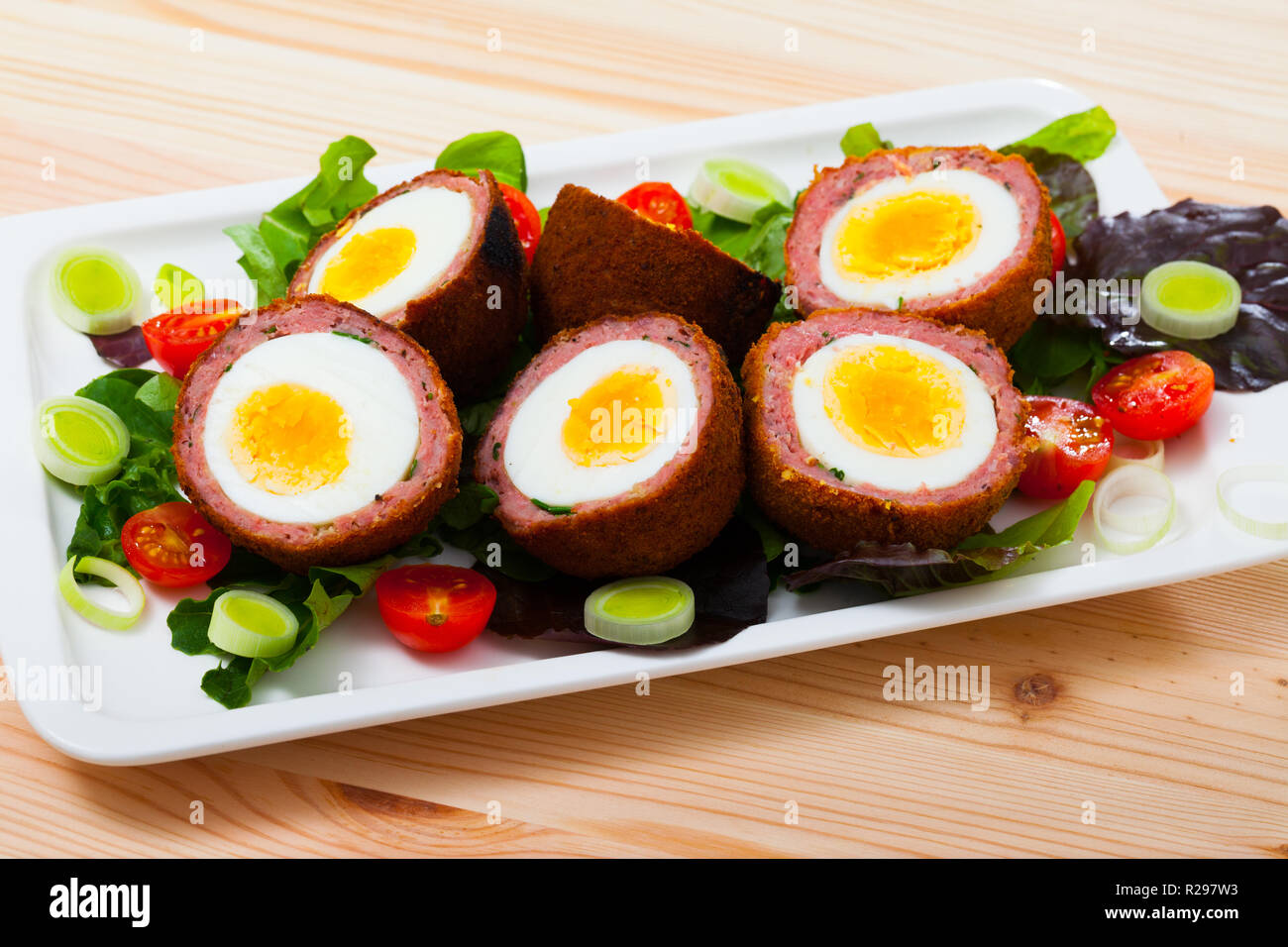 Traditional British picnic food delicious Scotch eggs cut in halves