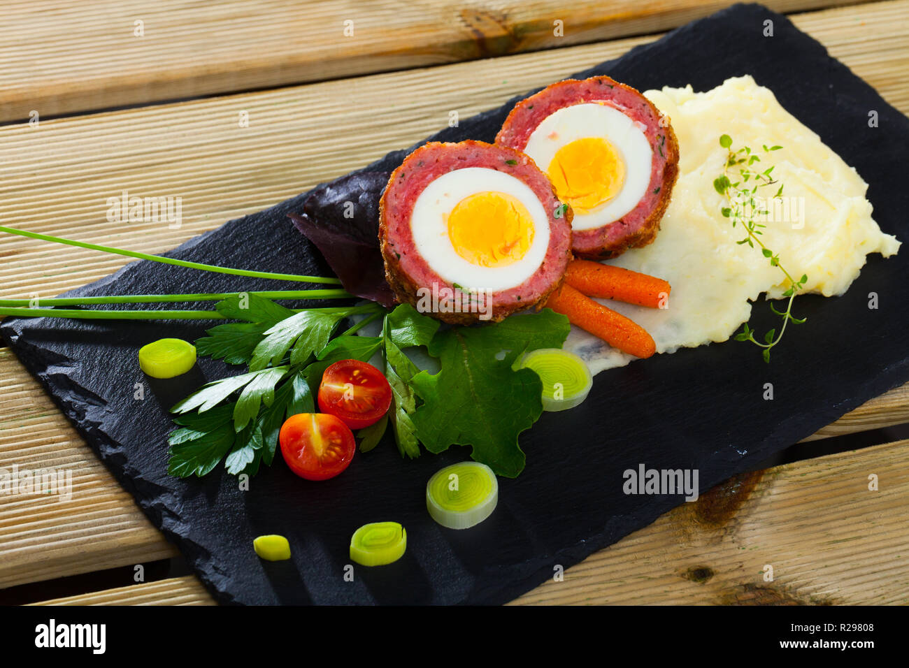 Traditional British picnic food delicious Scotch egg cut in halves