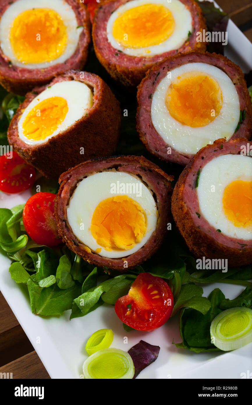 Traditional British picnic food delicious Scotch eggs cut in halves