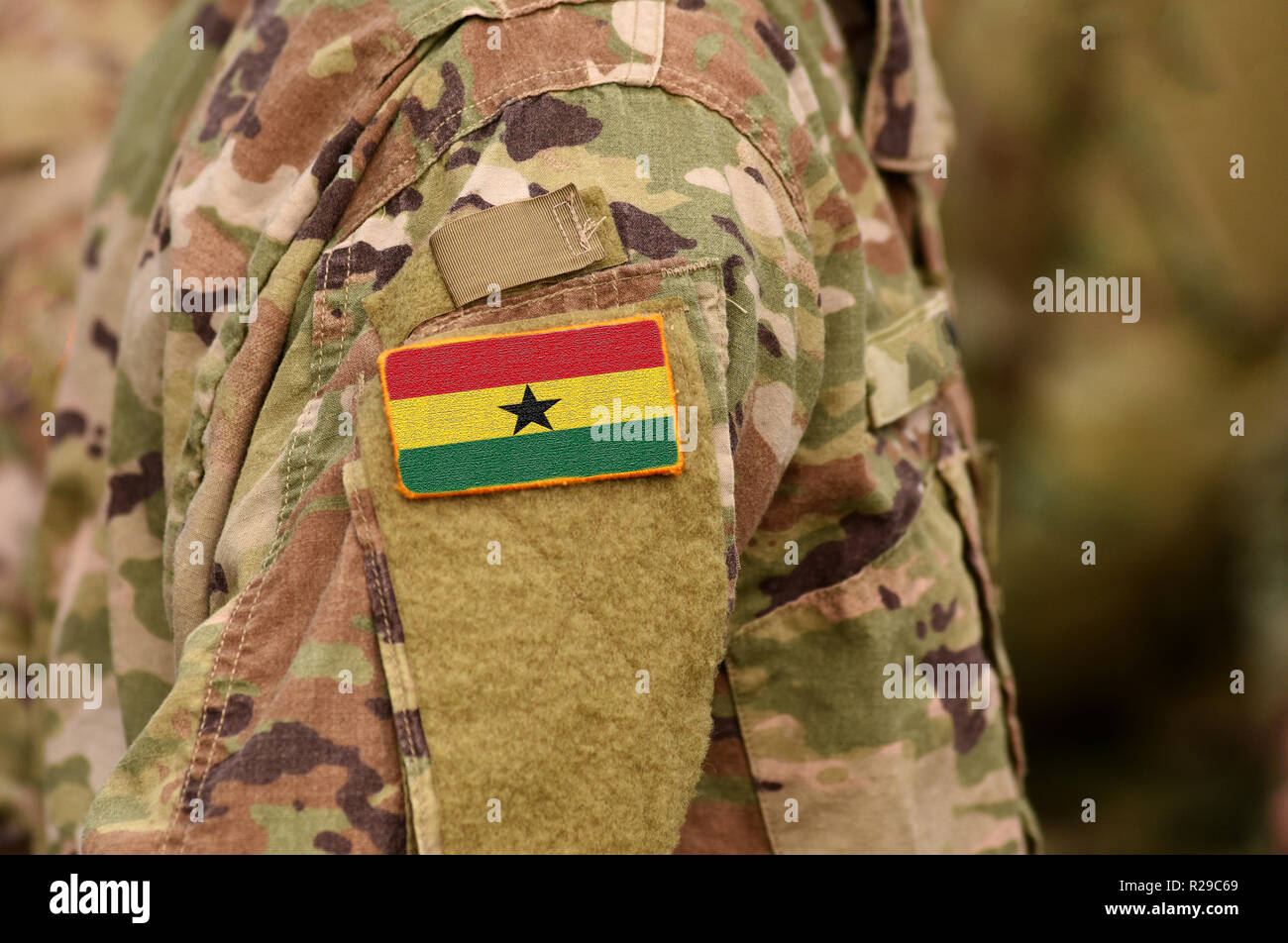 Ghana flag on soldiers arm. Ghana troops (collage Stock Photo Alamy