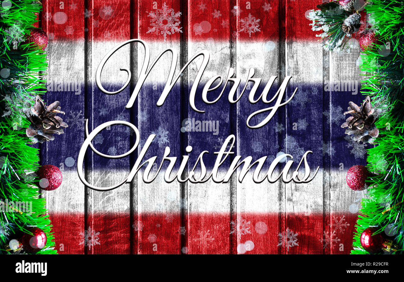 Merry christmas holiday concept with blurred flag image of Thailand