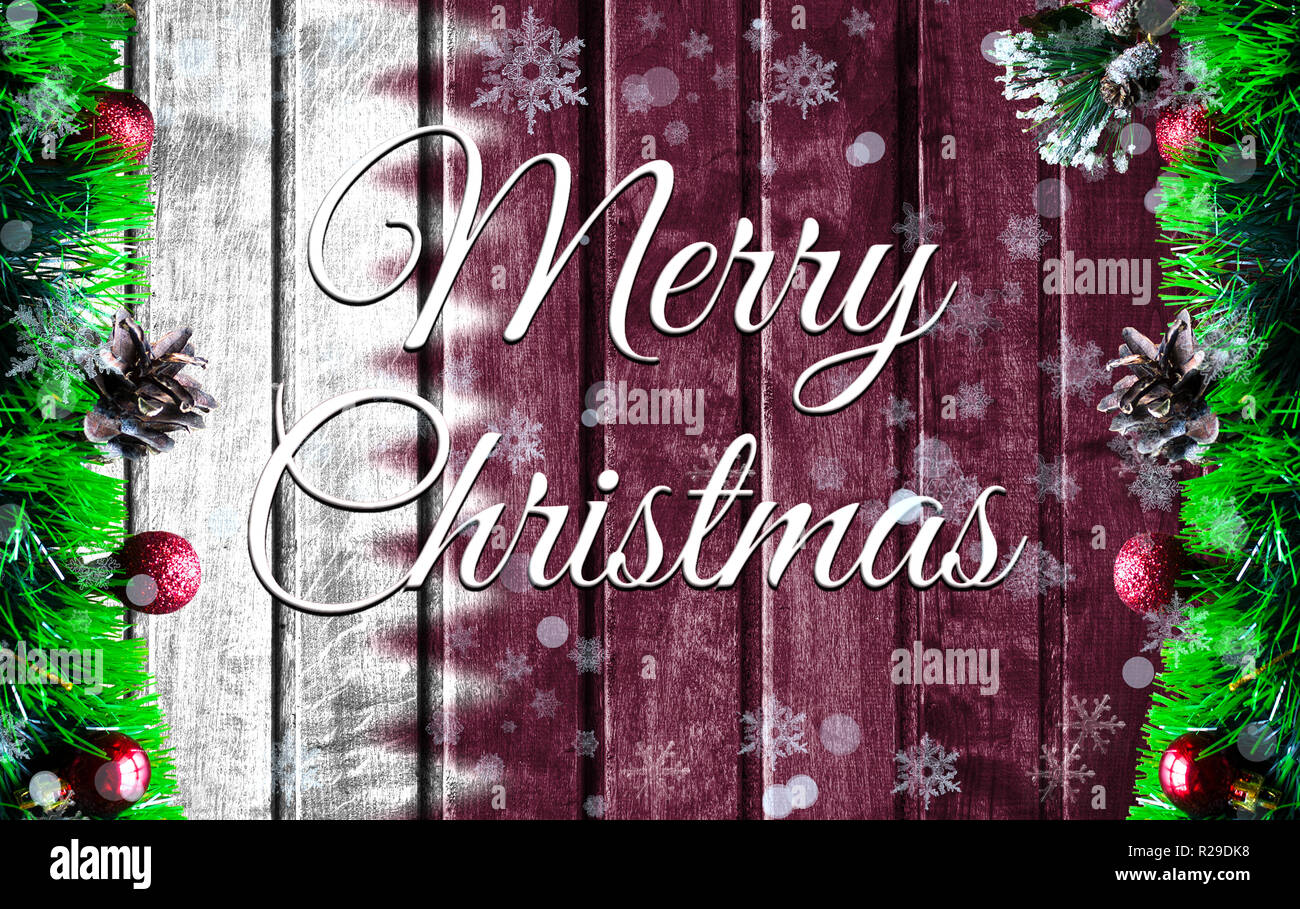 Merry christmas holiday concept with blurred flag image of Qatar, Xmas