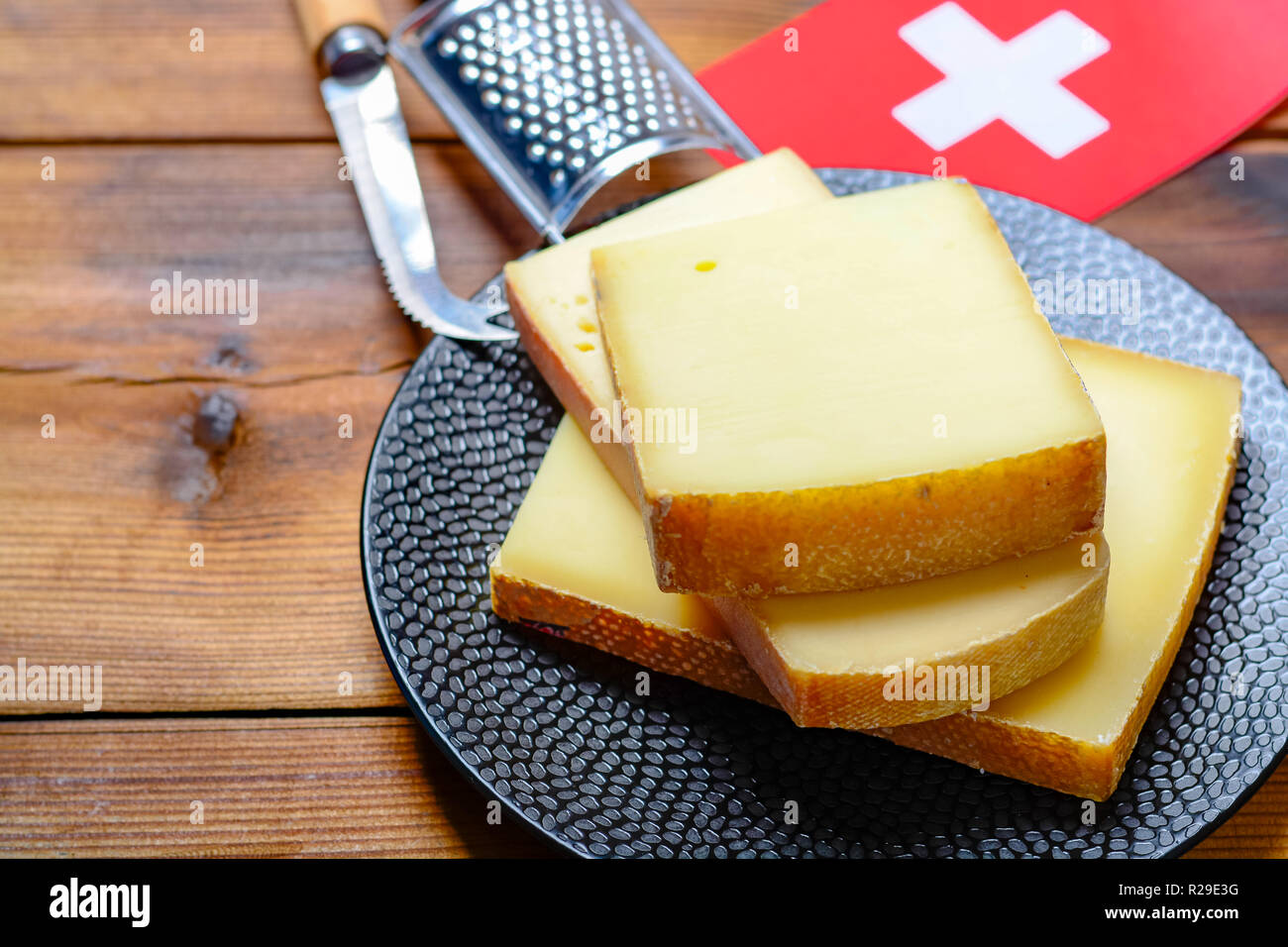 Assortment of Swiss cheeses Emmental or Emmentaler mediumhard cheese