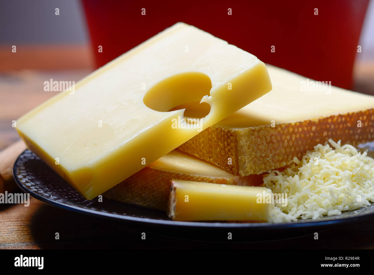 Assortment of Swiss cheeses Emmental or Emmentaler mediumhard cheese