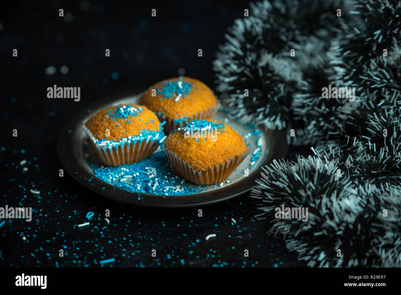 lemon muffins sprinkled with blue and white sprinkles Stock Photo