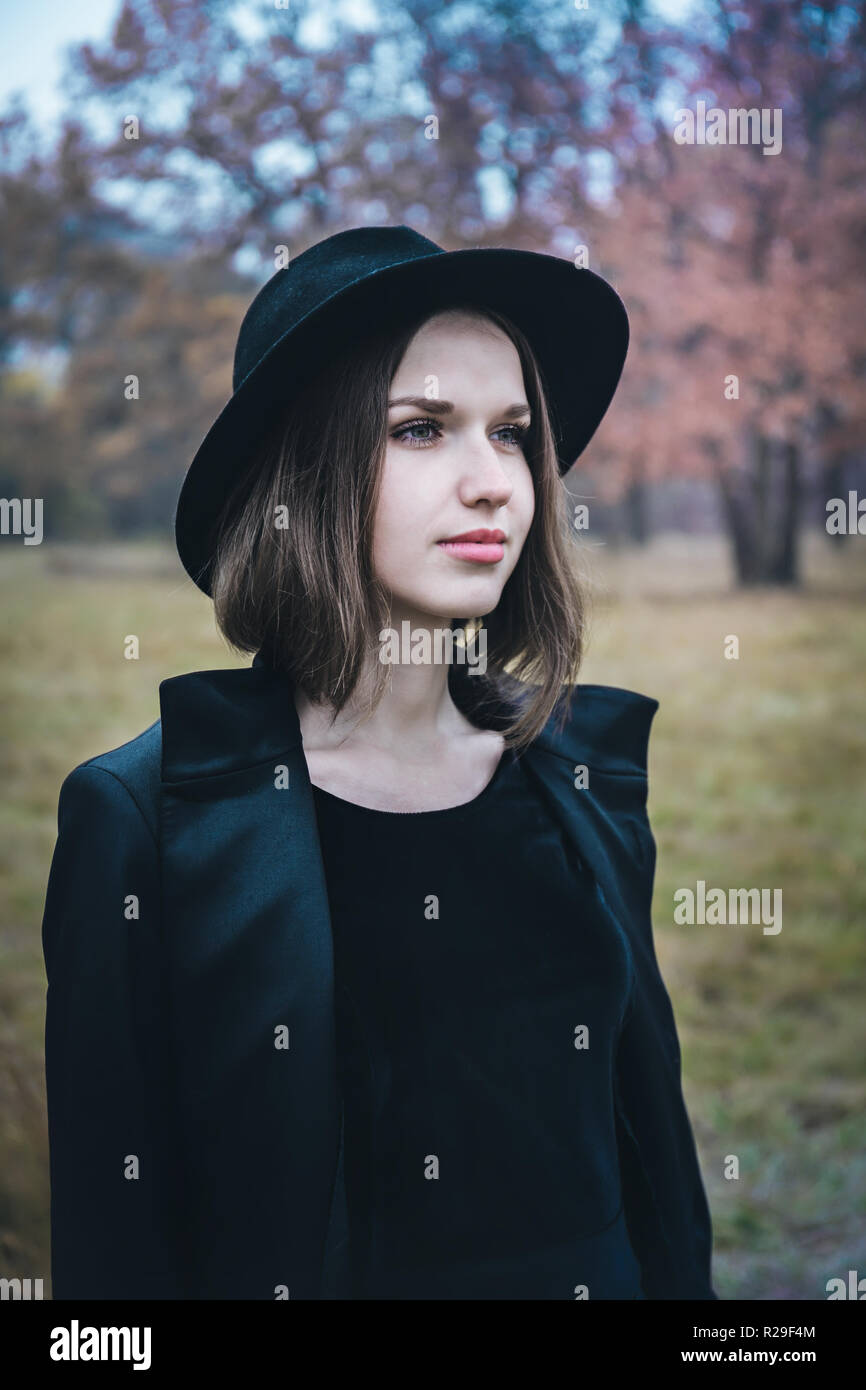 girl in a black hat Stock Photo - Alamy