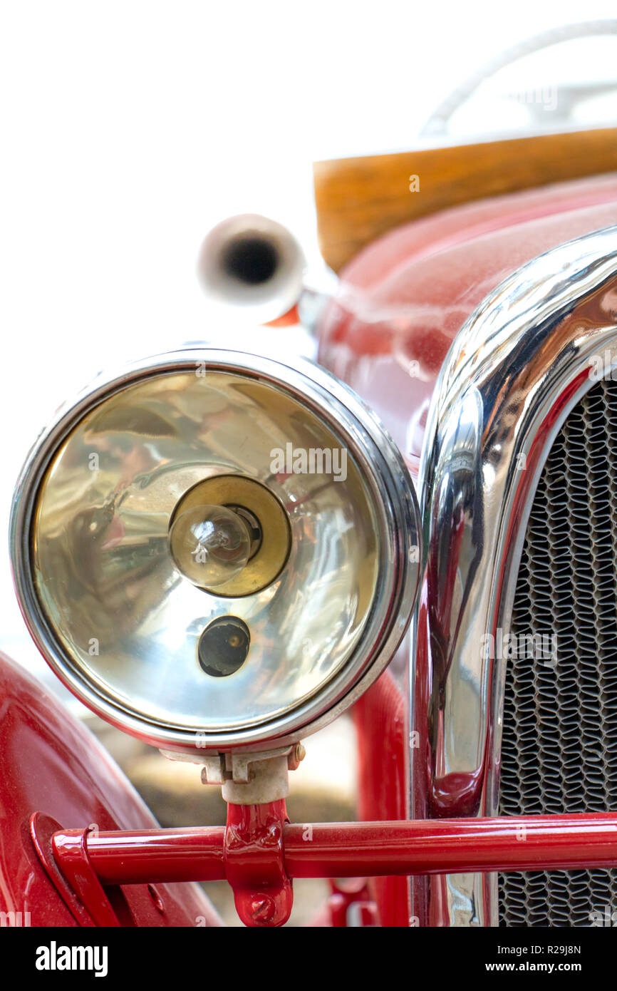 The Headlight Of The Old Car Veteran Car With Large Chrome Light Close Up Front Mask Of Retro Car Stock Photo Alamy