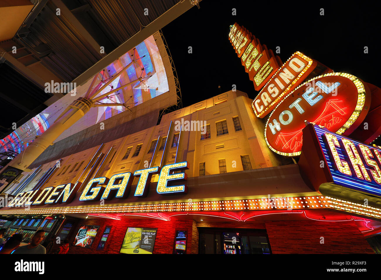 Neon lights of casinos and the Golden Gate in Fremont Street at night, Las Vegas, Nevada, America Stock Photo