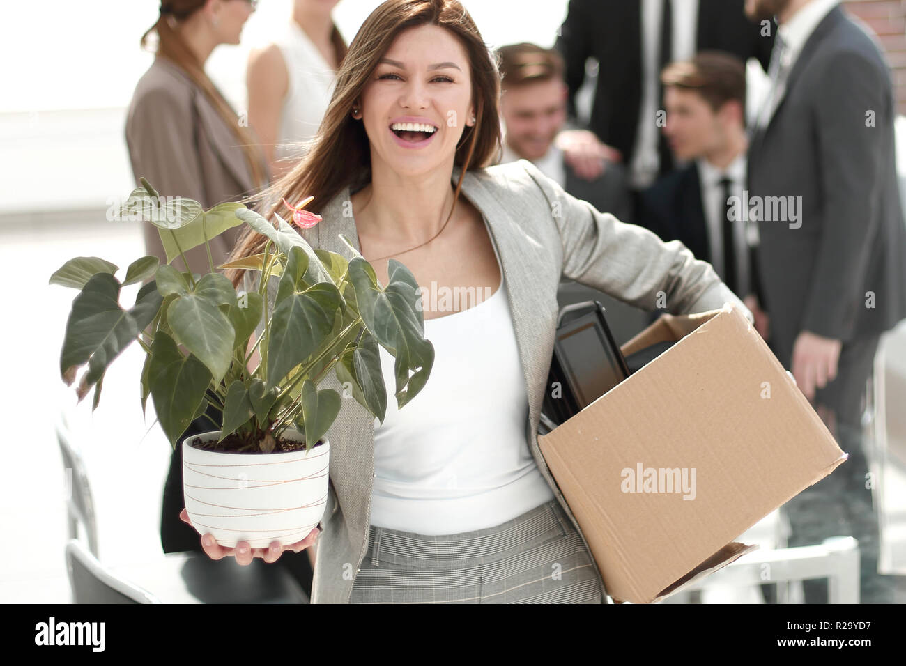 happy young business woman standing in new office Stock Photo - Alamy