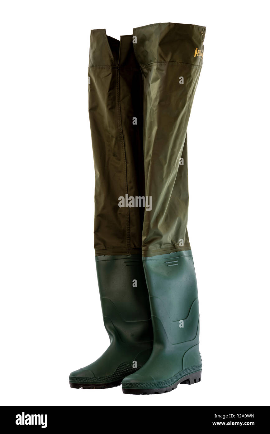 Pair of fishing waders or hip boots. Wellington boots with leg protection. Stock Photo