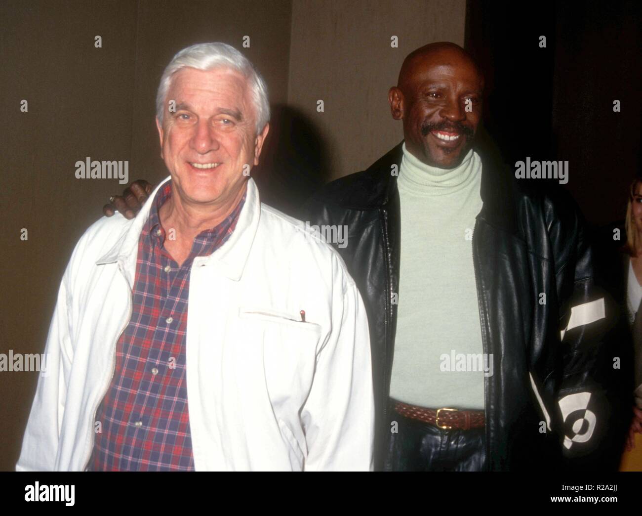 BEVERLY HILLS, CA - JANUARY 23: Actor Leslie Nielsen  and actor Lou Gossett Jr. attend the 50th Annual Golden Globe Awards on January 23, 1993 at the Beverly Hilton Hotel in Beverly Hills, California. Photo by Barry King/Alamy Stock Photo Stock Photo
