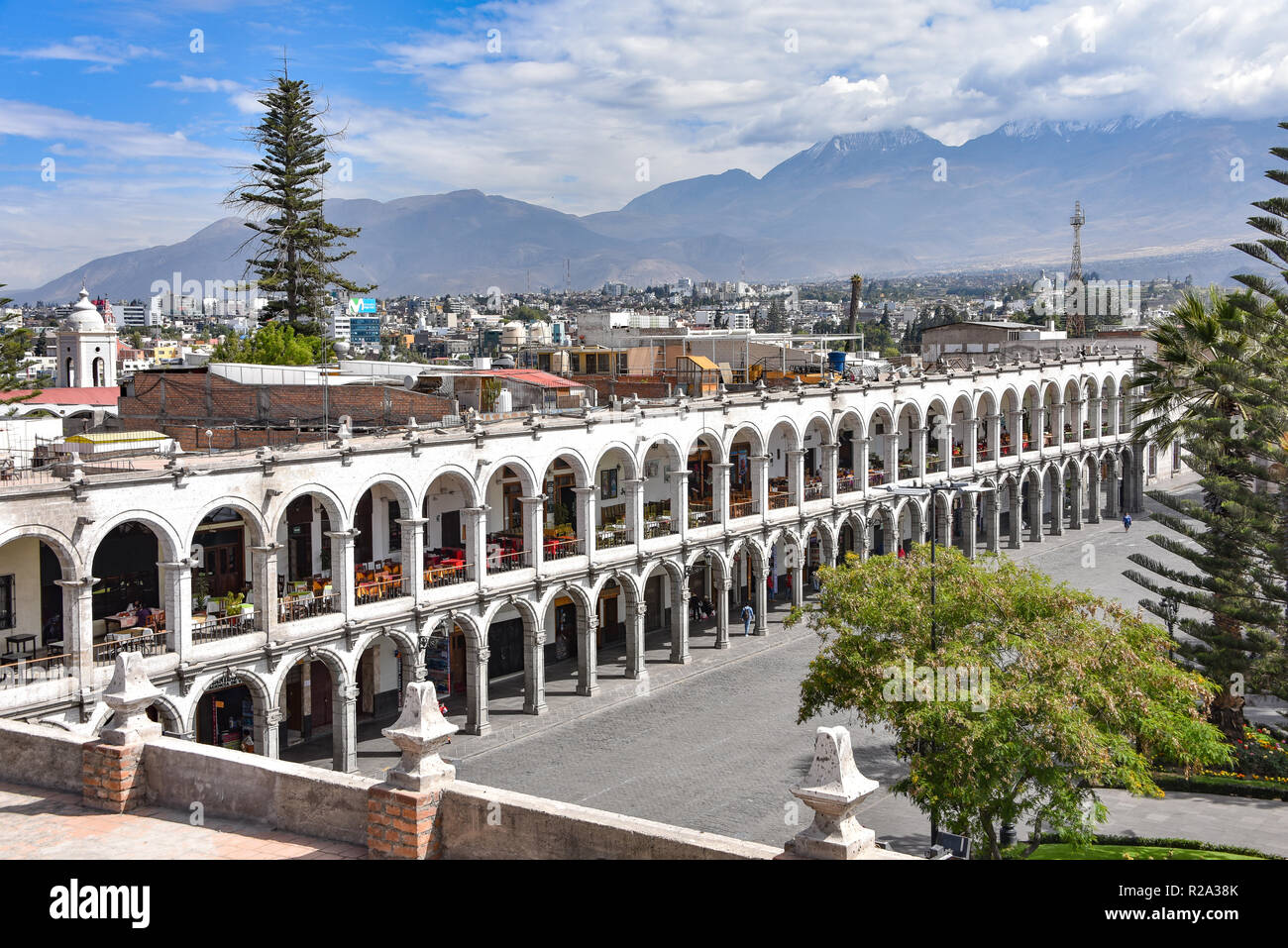 Arequipa, Peru - October 7, 2018: Colonial buildings and archways made of white Sillar stone in the Plaza de Armas, Arequipa Stock Photo