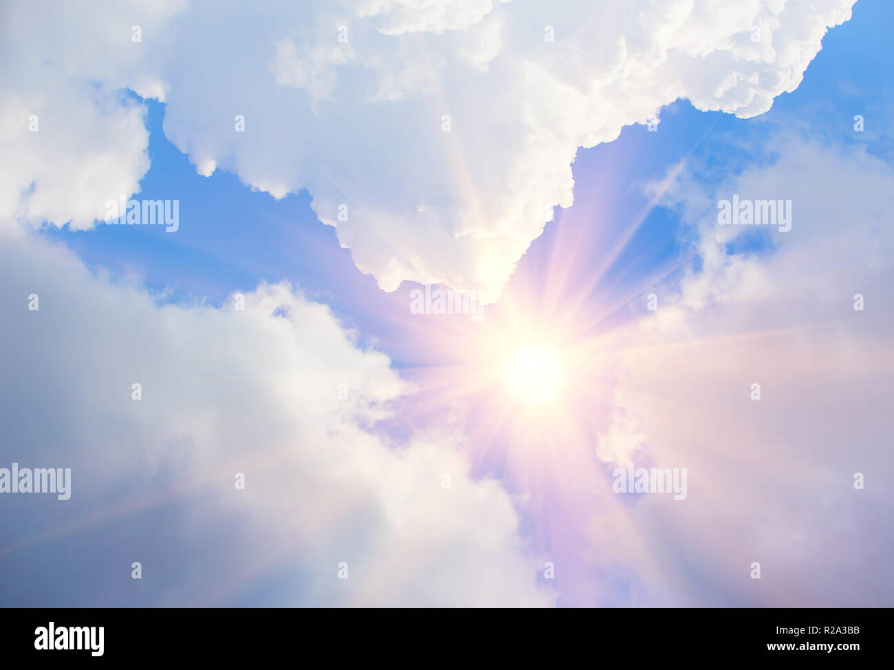 blue sky with clouds closing the sun Stock Photo Alamy