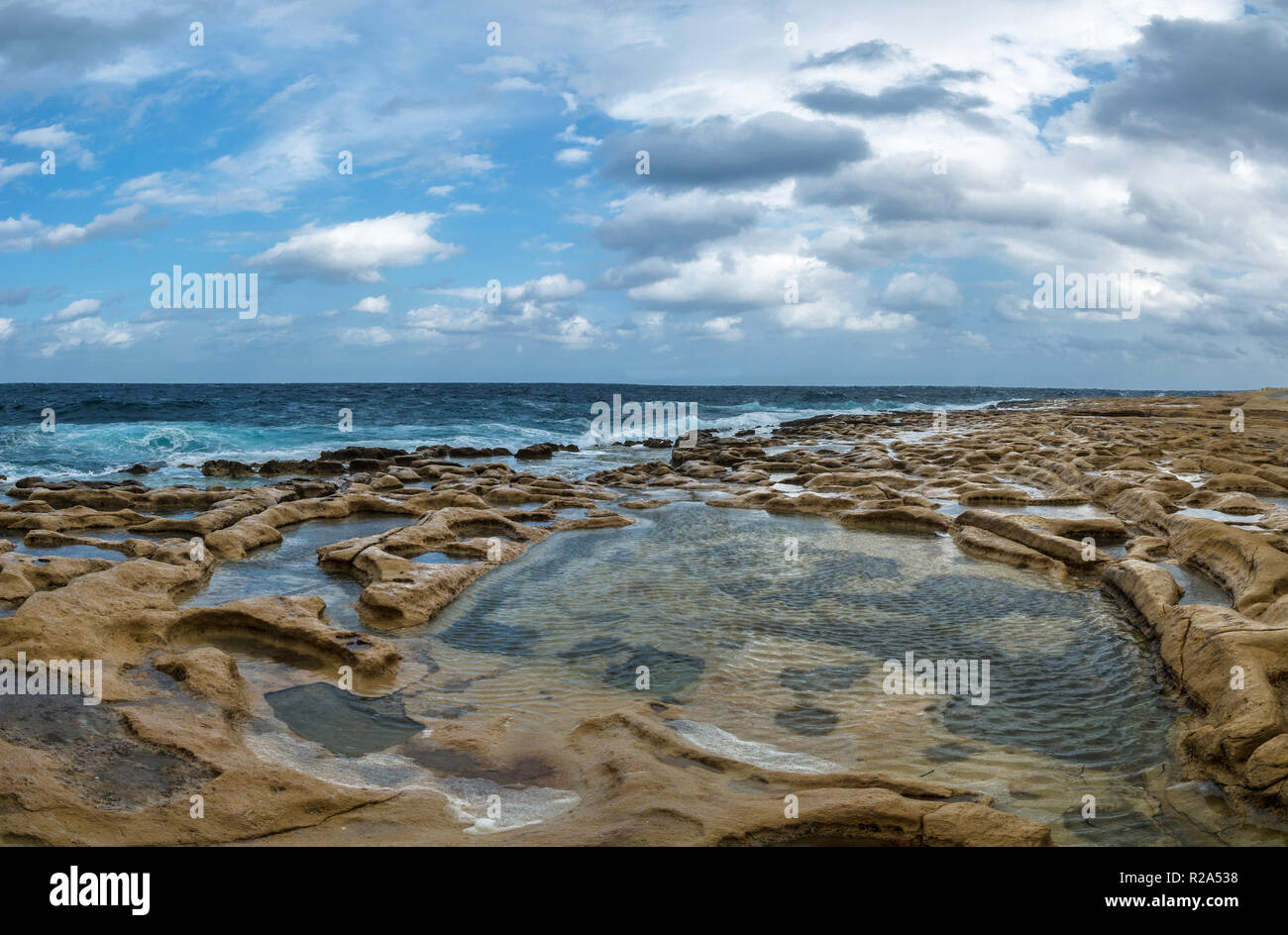 The rocky coast of Sliema, close to Valletta, Malta. Stock Photo
