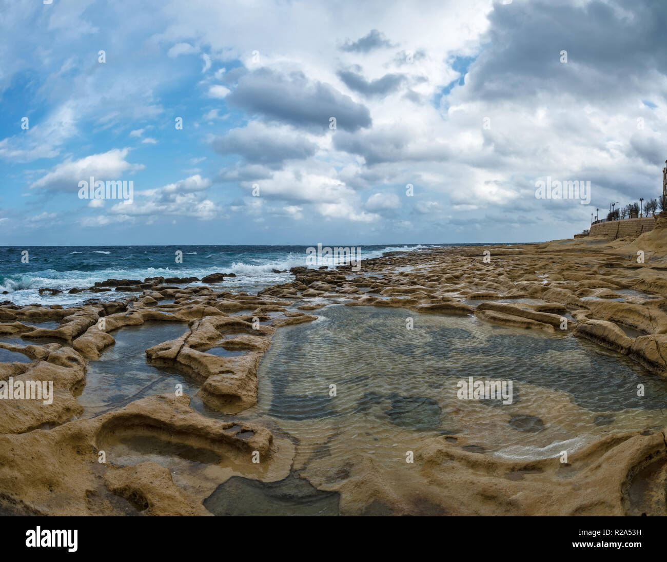 The rocky coast of Sliema, close to Valletta, Malta. Stock Photo