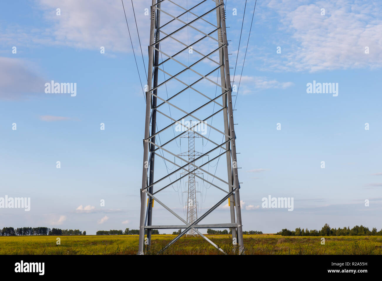 high voltage power line on metal poles Stock Photo Alamy