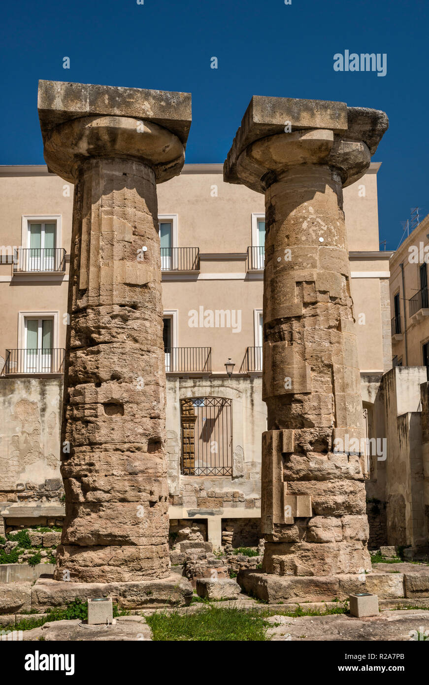 Greek Doric Temple columns, 6th century BC, in Taranto, Apulia, Italy Stock Photo
