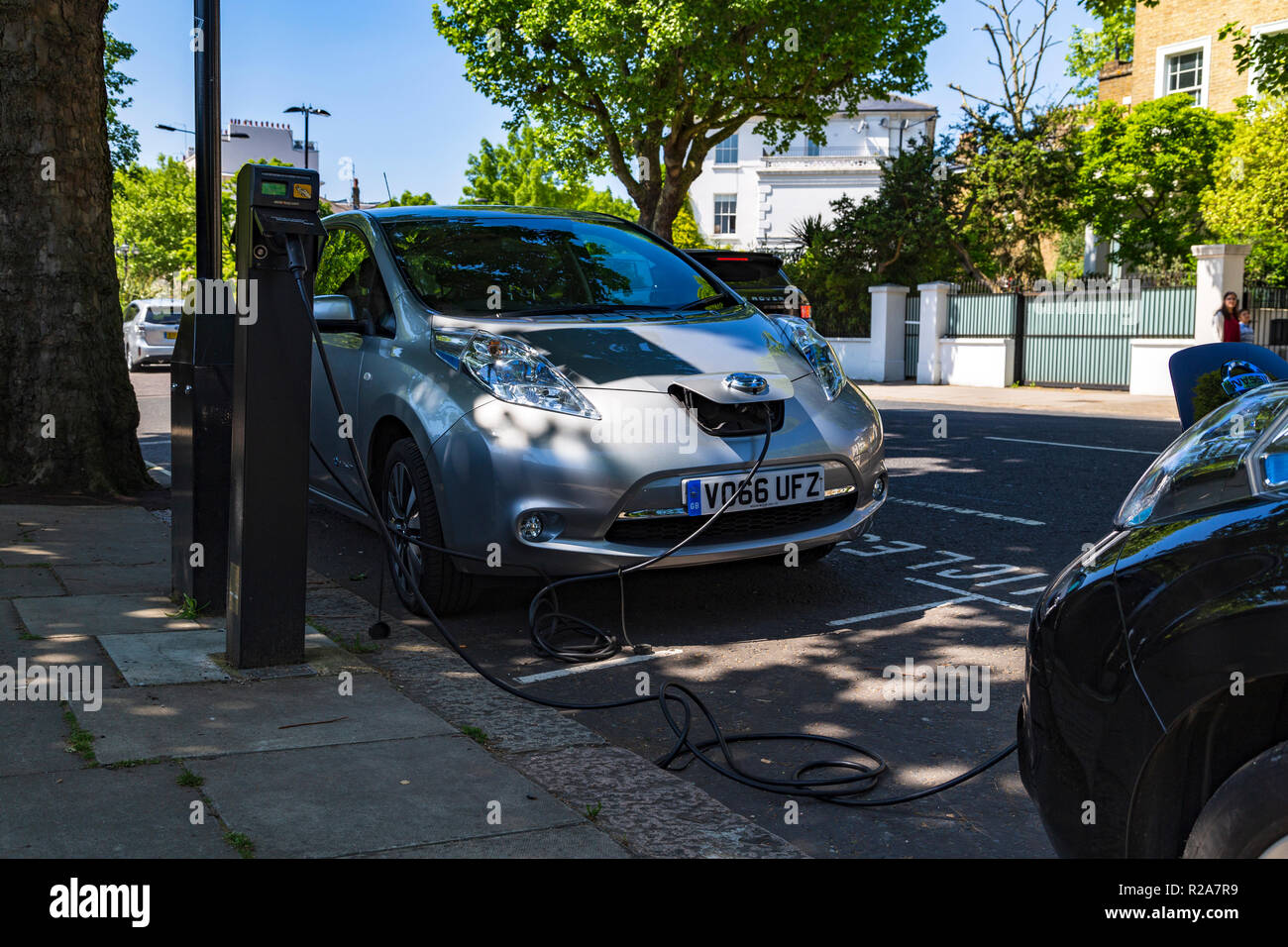 Electric cars charging in London, UK Stock Photo Alamy