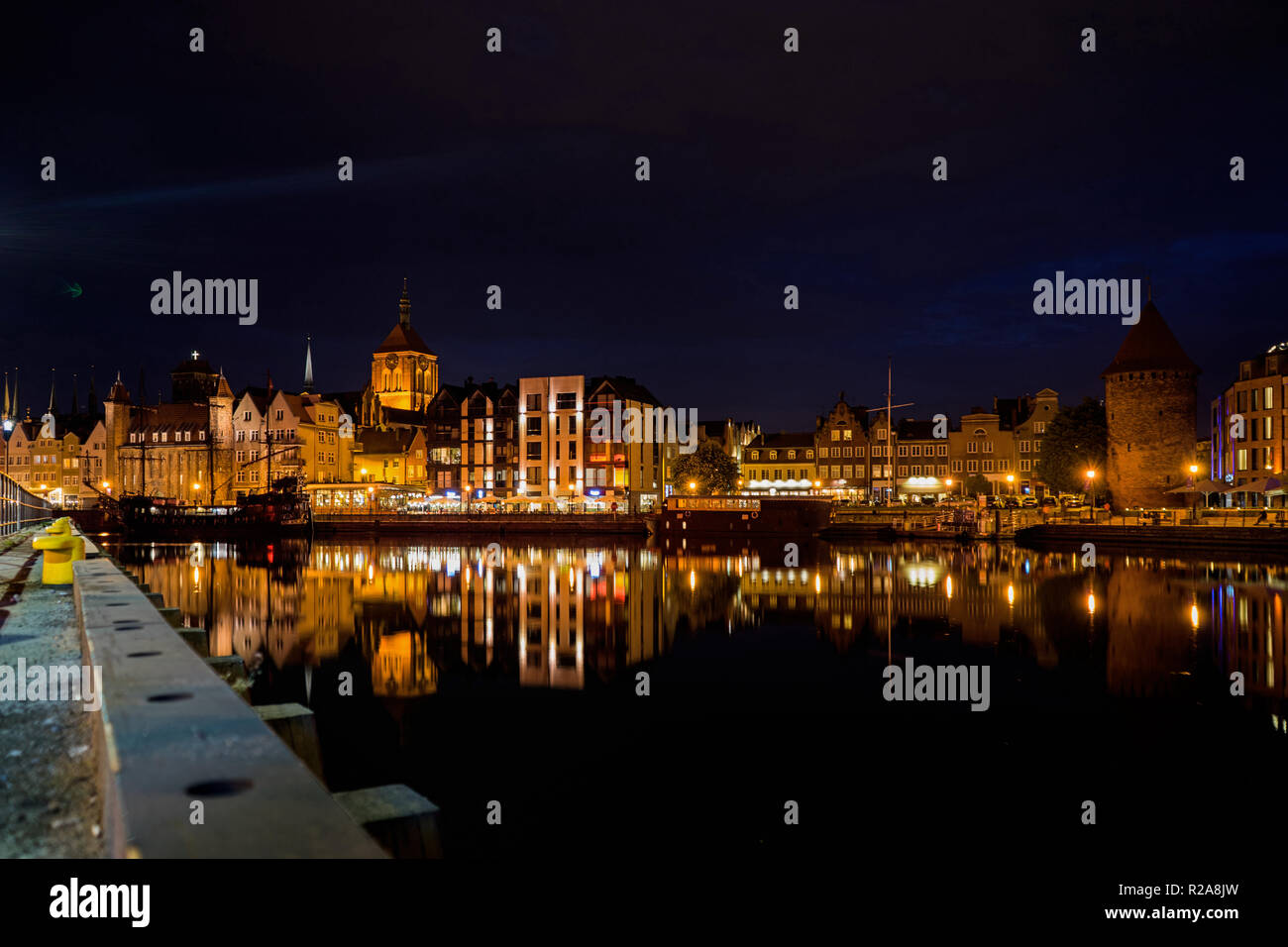 Night photograph of the canal waterfront of the city of Gdansk, Poland. Stock Photo