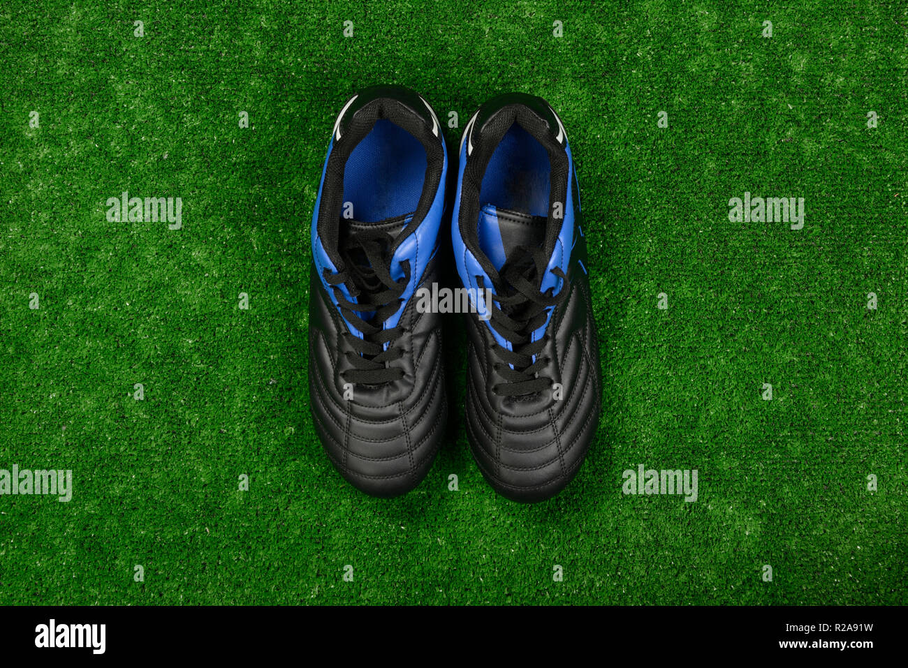 Football boots on the artificial grass 