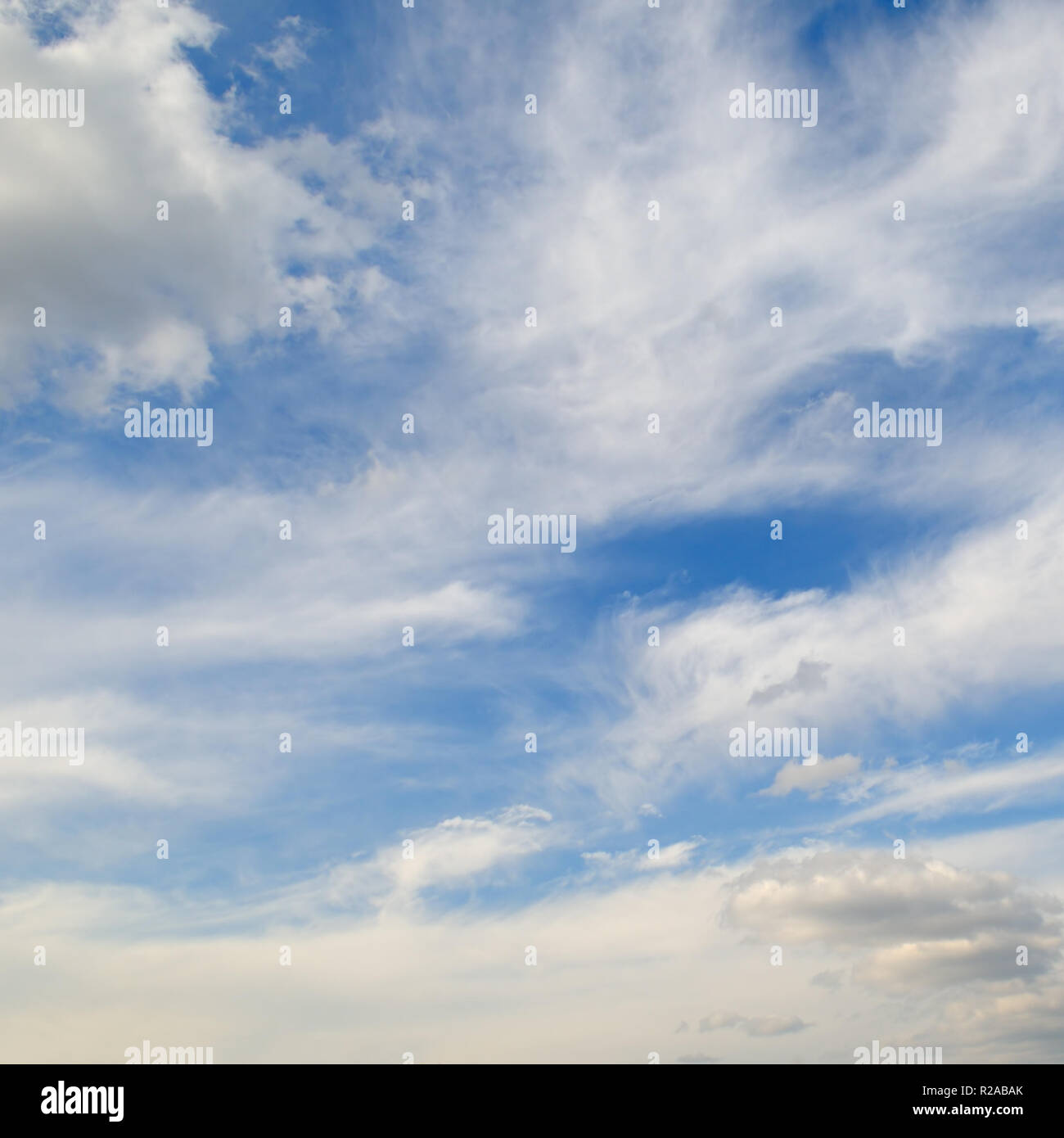 light cumulus clouds in the blue sky Stock Photo - Alamy