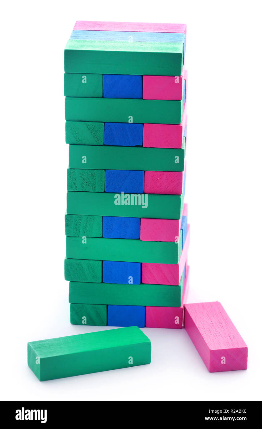 Jenga building of colorful wooden blocks Stock Photo Alamy