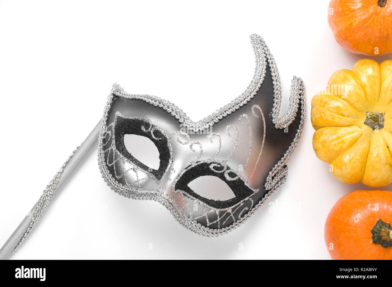 Halloween Mask with Miniature Pumpkin and Squash on White Background