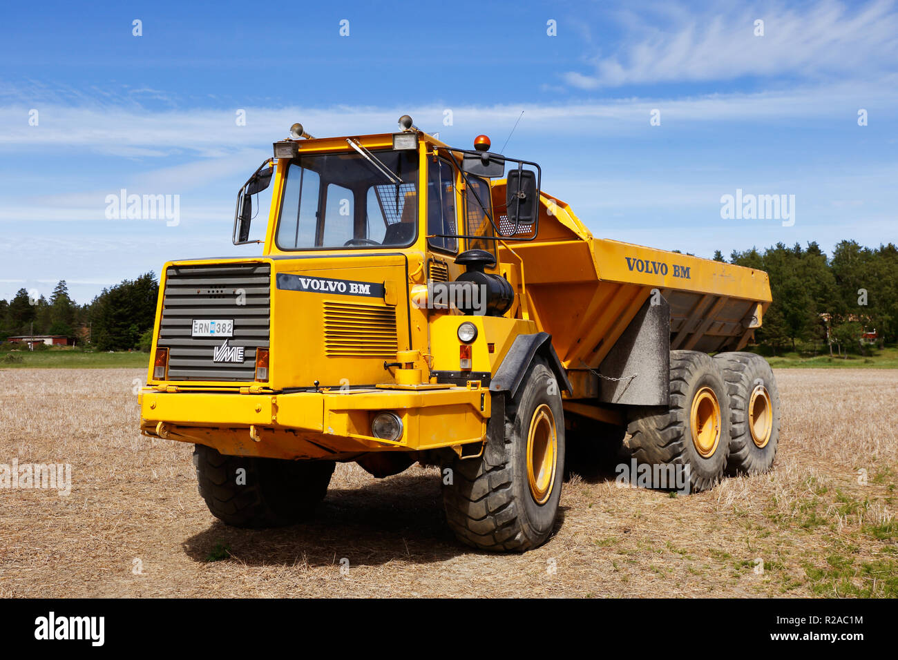 Enhorna, Sweden - June 6, 2018: An yellow painted articulated hauler VOLVO BM 5350 6X6 produced 1987. Stock Photo