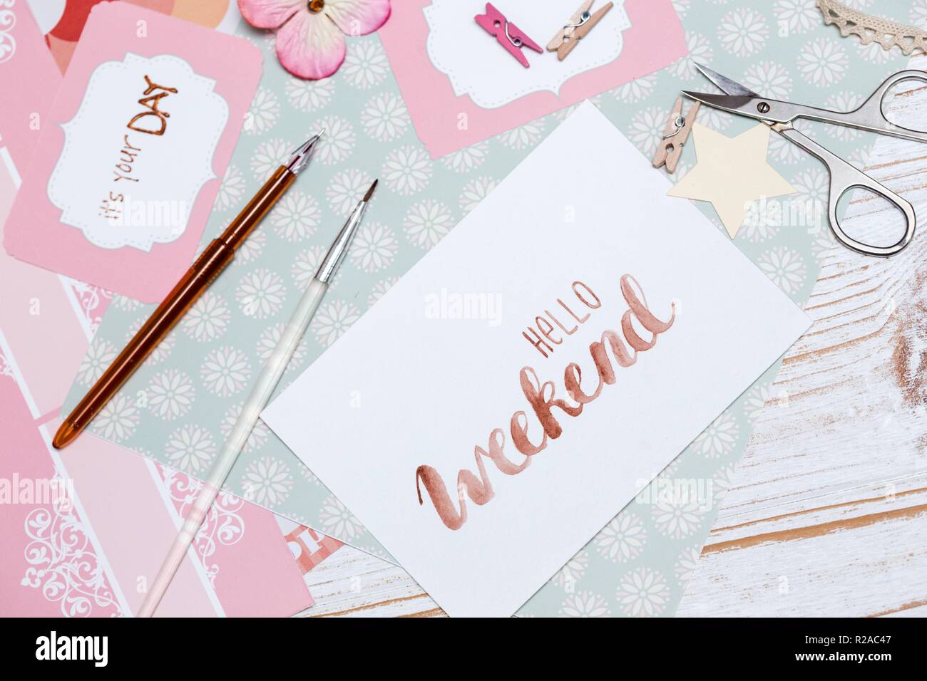 scrapbook background. hello weekend - process of creating a postcard ...