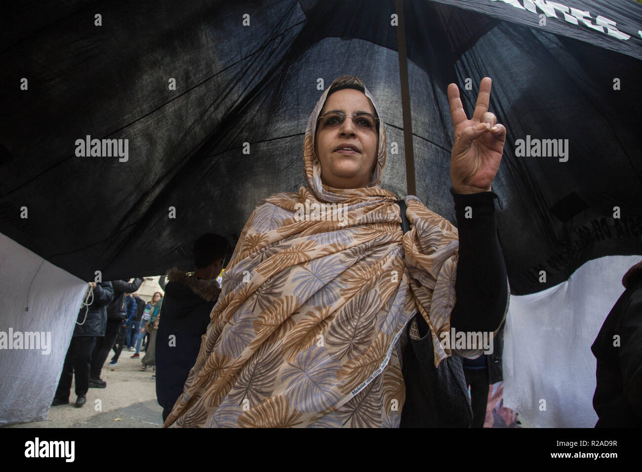 Saharawi Woman Demands The Release Of The Saharawi Prisoners In Morocco With The Famous Symbol Of Victory Under A Typical Tent In The Refugee Camps In Algeria During The Demonstration Hundreds Of Saharawi Woman Demands The Release Of The Saharawi Prisoners In Morocco With The Famous Symbol Of Victory Under A Typical Tent In The Refugee Camps In Algeria During The Demonstration Hundreds Of