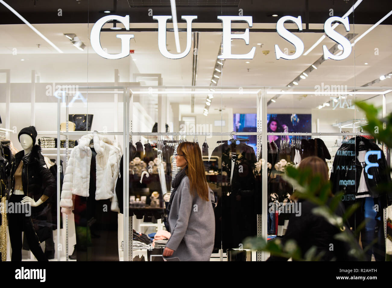 Krakow, Poland. 16th Nov, 2018. A woman seen past the Guess shop. Credit:  Omar Marques/SOPA Images/ZUMA Wire/Alamy Live News Stock Photo - Alamy