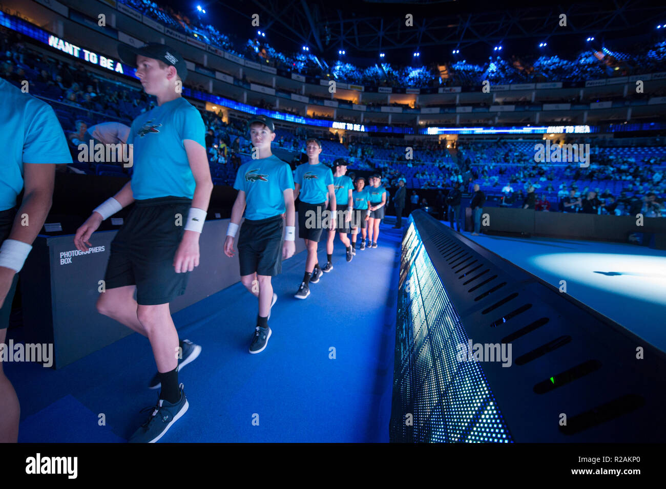 O2, London, UK. 18 November, 2018. Centre court at the O2 gears up for  Finals day of the Nitto ATP Finals 2018. Ball Kids line up to take part in  the Doubles