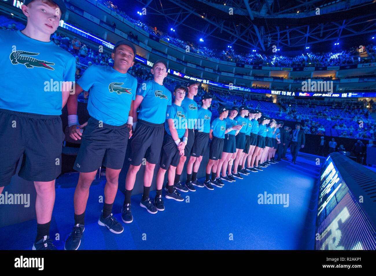 O2, London, UK. 18 November, 2018. Centre court at the O2 gears up for  Finals day of the Nitto ATP Finals 2018. Ball Kids line up to take part in  the Doubles