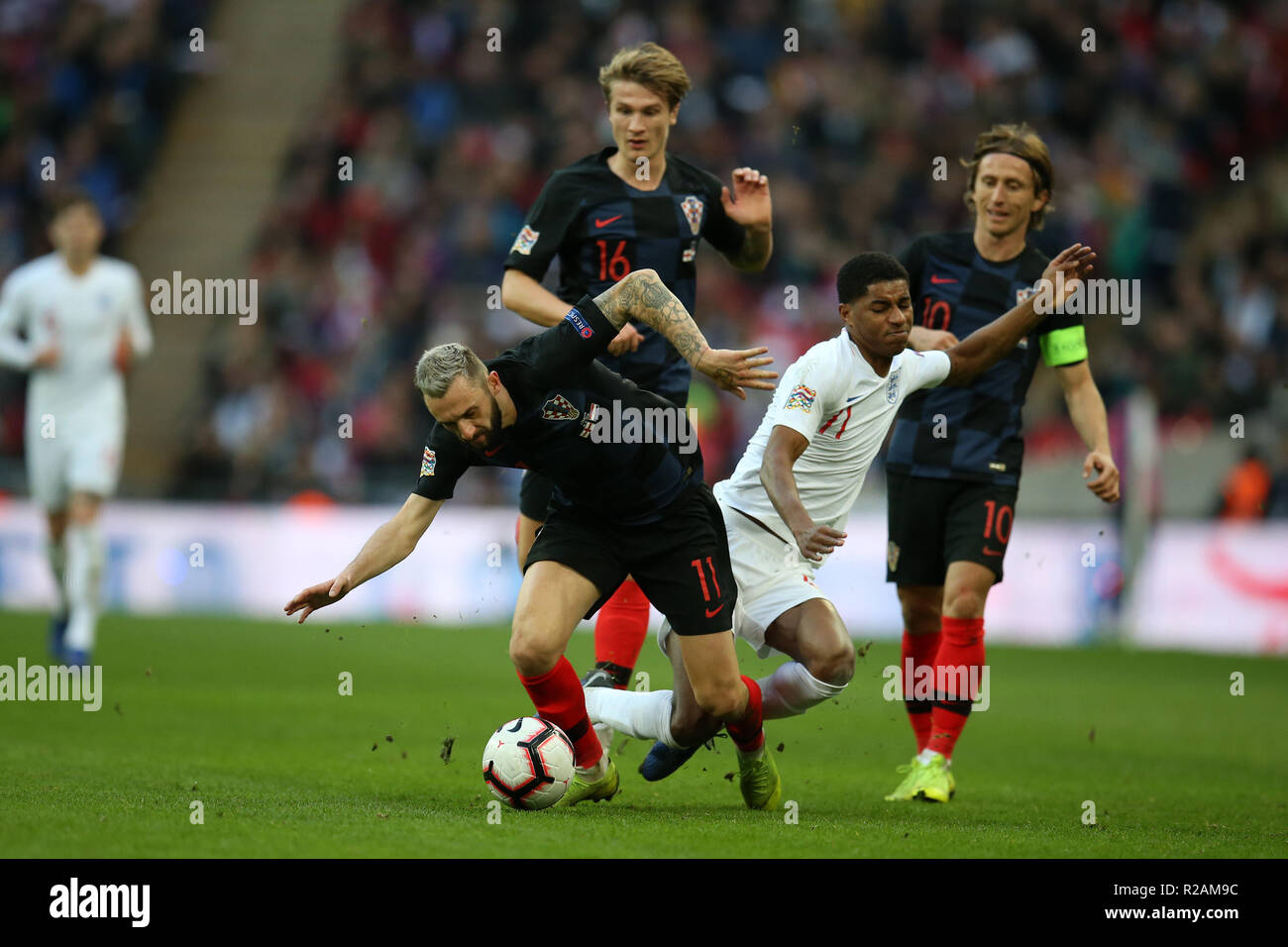 London, UK. 18th November 2018. London, UK. 18th November 2018. London, UK. 18th November 2018. London, UK. 18th November 2018.Marcus Rashford of England is blocked and fouled by Croatia's Marcelo Brozovic (l) and Tin Rebic (16).UEFA Nations league A, group 4 match, England v Croatia at Wembley Stadium in London on Sunday 18th November 2018.  Please note images are for Editorial Use Only. pic by Andrew Orchard/Alamy Live news Credit: Andrew Orchard sports photography/Alamy Live News Credit: Andrew Orchard sports photography/Alamy Live News Stock Photo