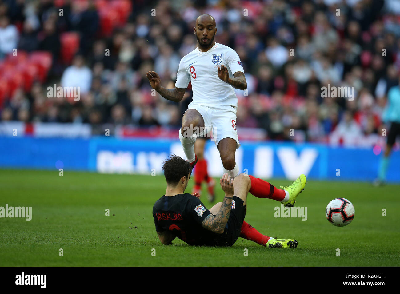 London, UK. 18th November 2018. London, UK. 18th November 2018. Fabian Delph of England is tackled by Sime Vrsaljko of Croatia. UEFA Nations league A, group 4 match, England v Croatia at Wembley Stadium in London on Sunday 18th November 2018.  Please note images are for Editorial Use Only. pic by Andrew Orchard/Alamy Live news Credit: Andrew Orchard sports photography/Alamy Live News Stock Photo