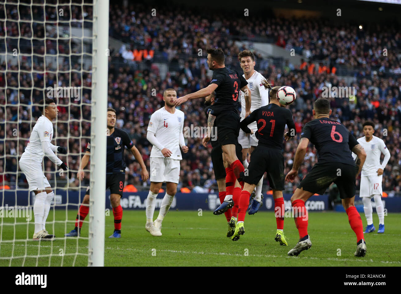 London, UK. 18th November 2018. John Stones of England jumps over everyone but heads wide of goal. UEFA Nations league A, group 4 match, England v Croatia at Wembley Stadium in London on Sunday 18th November 2018.  Please note images are for Editorial Use Only. pic by Andrew Orchard/Alamy Live news Stock Photo