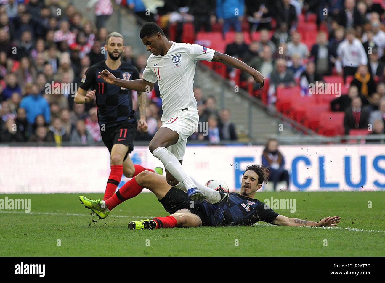 London, UK. 18th November 2018. Marcus Rashford of England is tackled by Sime Vrsaljko of Croatia during the UEFA Nations League League A Group 4 match between England and Croatia at Wembley Stadium on November 18th 2018 in London, England. (Photo by Matt Bradshaw/phcimages.com) Credit: PHC Images/Alamy Live News Stock Photo