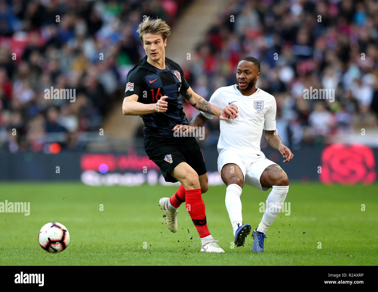 Croatia's Tin Jedvaj (left) and England's Raheem Sterling (right
