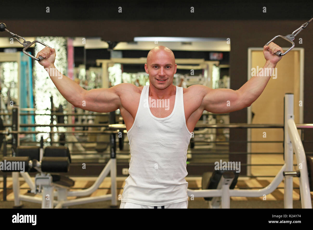 Young strong man workout exercise in gym Stock Photo - Alamy