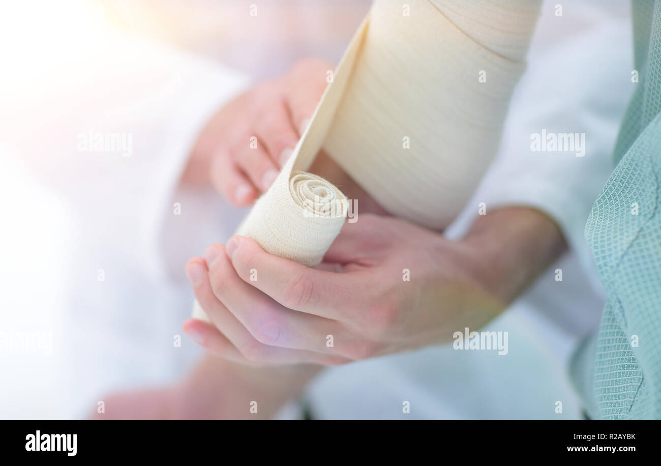 closeup.doctor applying elastic bandage Stock Photo Alamy