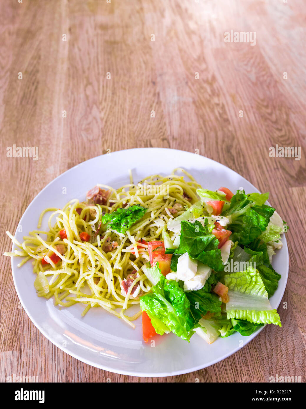 Appetising and fresh looking spaghetti Carbonara pasta dinner with