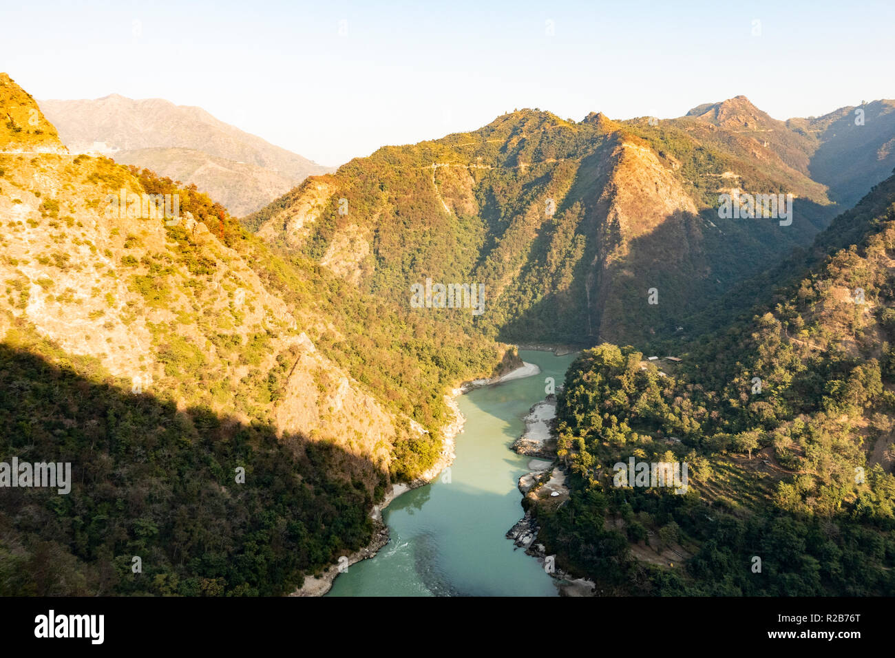 Spectacular view of the sacred Ganges river flowing through the green ...