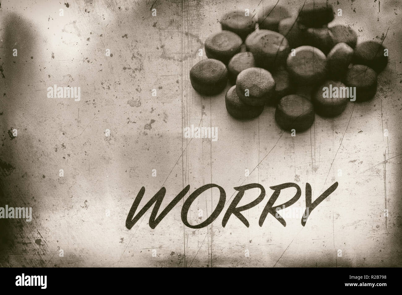 Concept of Worry and medical pills Stock Photo