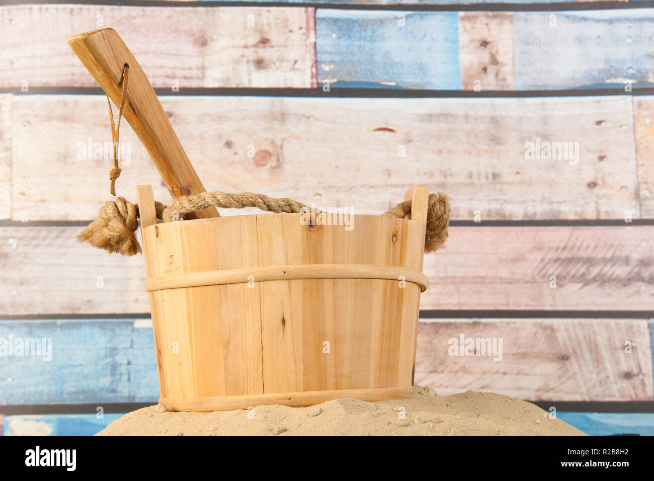 Wooden sauna bucket and spoon in interior Stock Photo Alamy