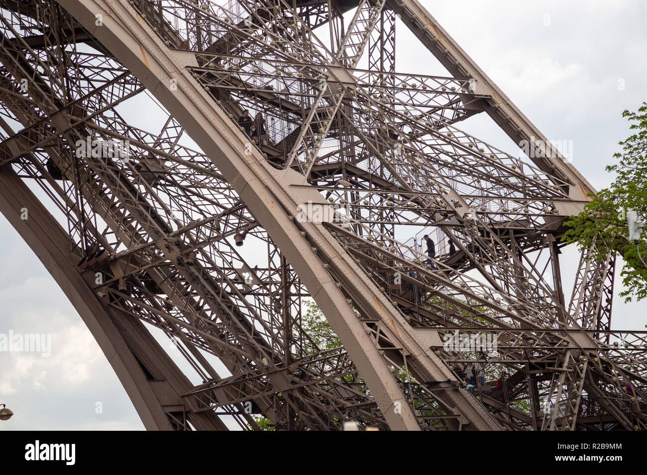 Paris/France - April 22nd 2017: People climbing the Eiffel Tower stairs Stock Photo