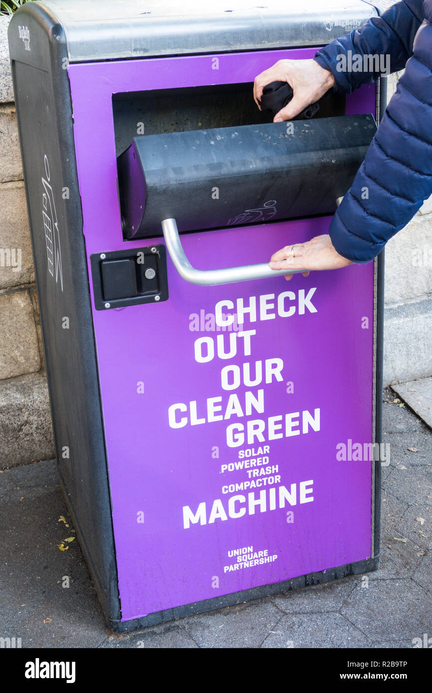 Public solar powered trash compactor in New York City, USA Stock Photo