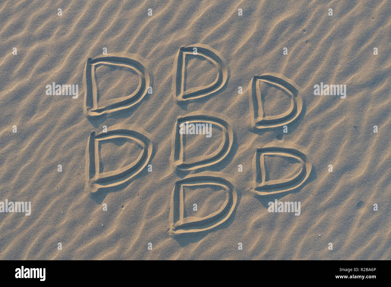 Blackberry logo brand sketched on the sand Stock Photo